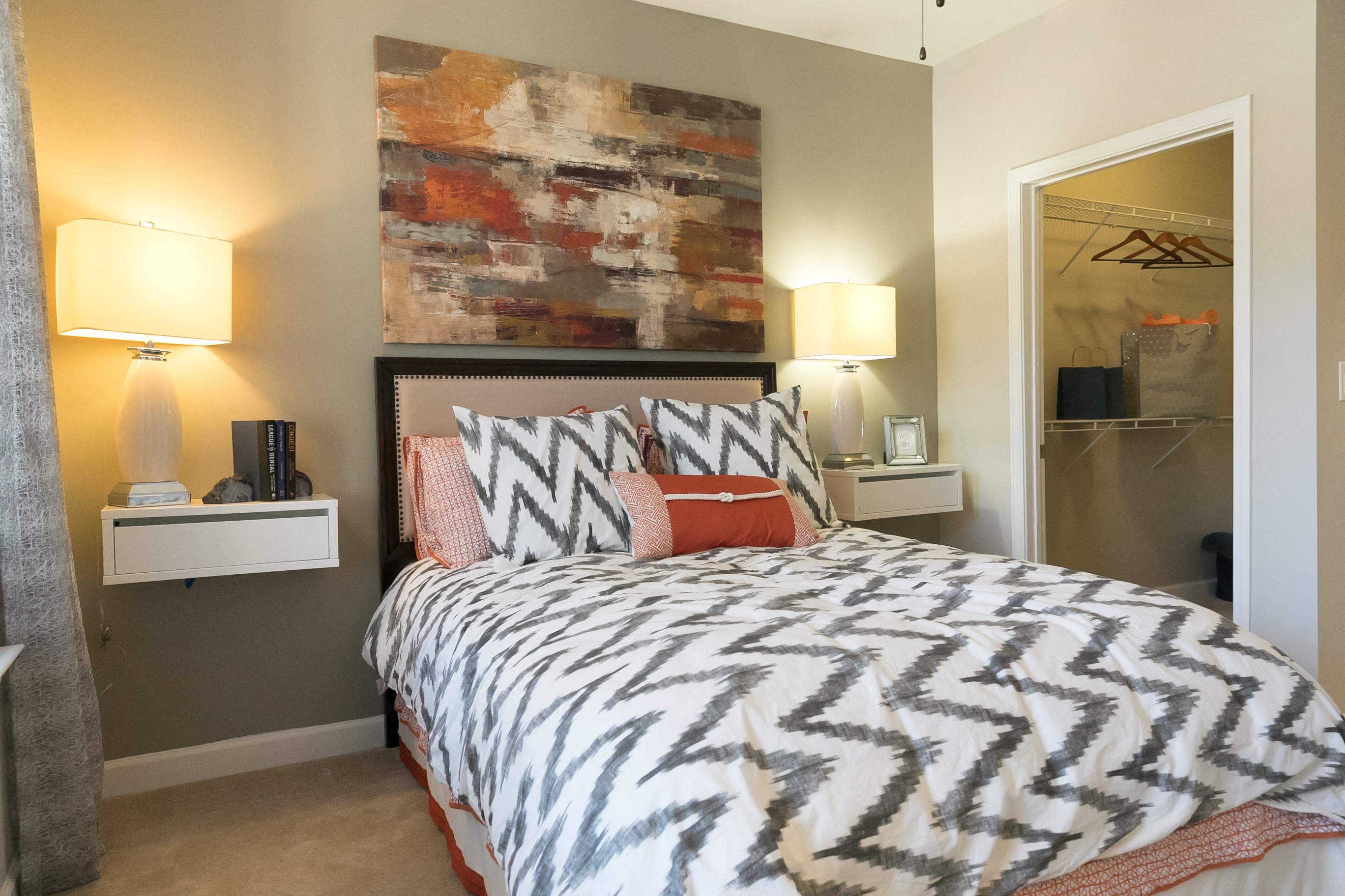One Bedroom Apartments in Johns Creek, GA - The Regency at Johns Creek Walk Apartments Bedroom with Carpet Flooring